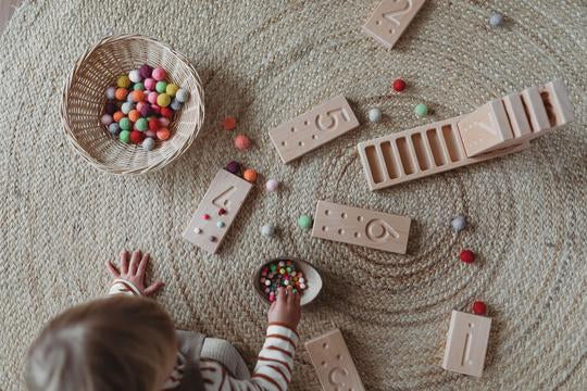 De filosofie achter houten speelgoed